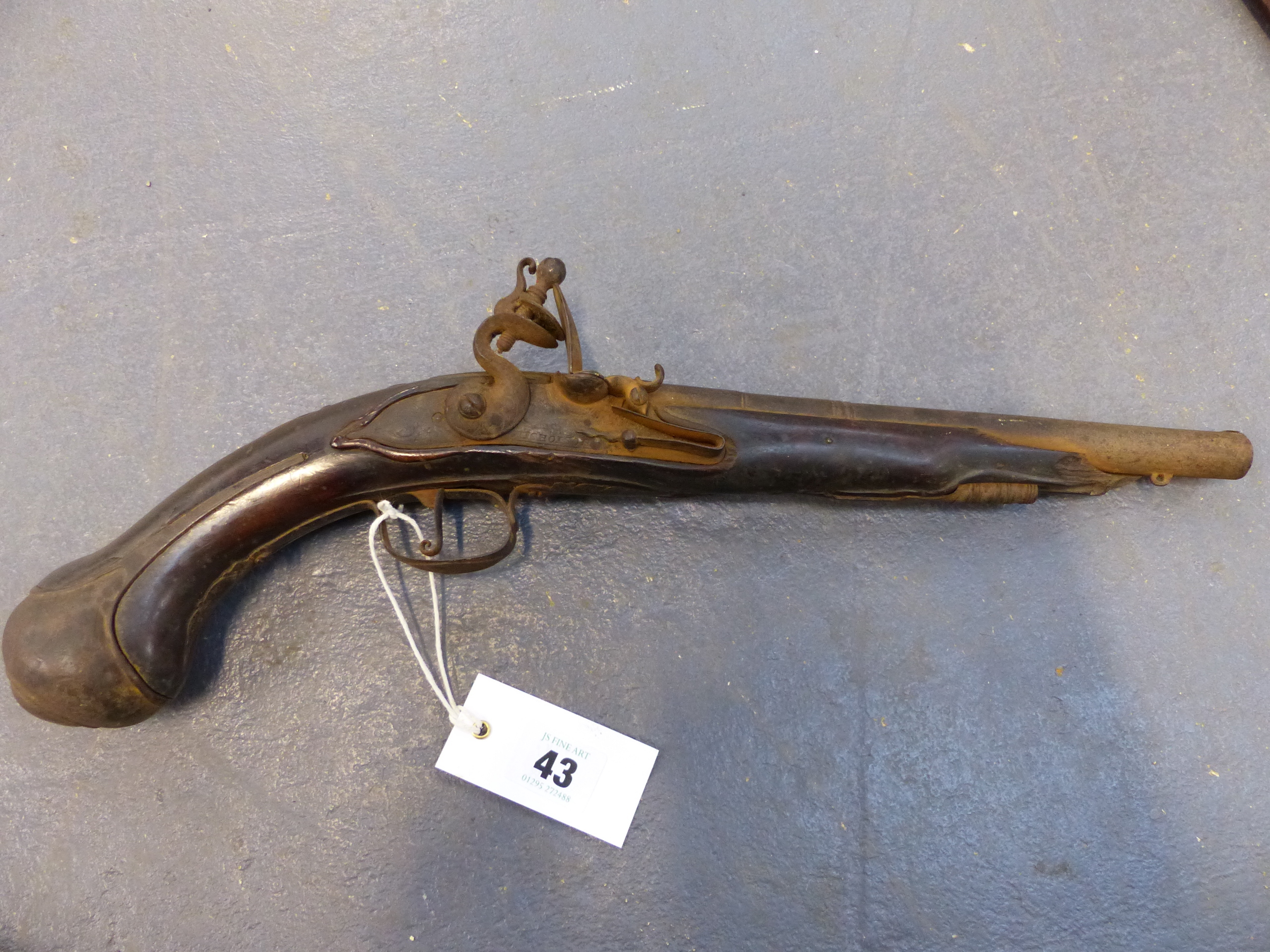 AN 18th. C. FLINTLOCK HOLSTER PISTOL. THE LOCK SIGNED NICHOLSON