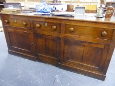 A GOOD GEORGIAN ELM AND FRUITWOOD COUNTRY DRESSER WITH THREE FRIEZE DRAWERS OVER PANELLED DOORS ON