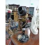 A VINTAGE CANDLESTAND TELEPHONE.