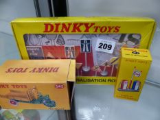 A DINKY FRENCH 490 FUEL PUMP SET, A SET OF DINKY 593 CONTINENTAL ROAD SIGNS AND A DINKY 342