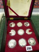 A BOXED SET OF EIGHTEEN .925 SILVER STANDARD PROOF CORONATION COINS CONTAINED IN ORIGINAL