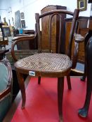 A THONET BENTWOOD CHILD'S ARMCHAIR.