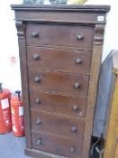 A VICTORIAN PINE WELLINGTON CHEST. W.58 x H.124cms.