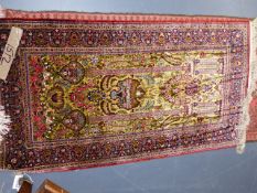 A FINELY WOVEN PERSIAN SILK PRAYER RUG. 138 x 74cms.