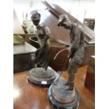 A PAIR OF BRONZE FIGURES OF GOLFERS, SIGNED ON MARBLE BASES, MODERN CASTS. H.34cms.