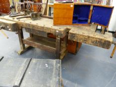 A GOOD CARPENTER'S WORKSHOP BENCH WITH VICE ON A TRESTLE BASE AND UNDERTIER. W.195 x H.84cms.