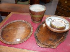 AN ANTIQUE CARVED OAK TRAY, A COOPERED BUCKET, BOWLS,ETC.