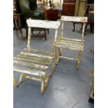 A PAIR OF ANTIQUE WROUGHT IRON WOOD SLAT GARDEN CHAIRS.
