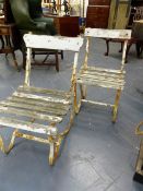 A PAIR OF ANTIQUE WROUGHT IRON WOOD SLAT GARDEN CHAIRS.