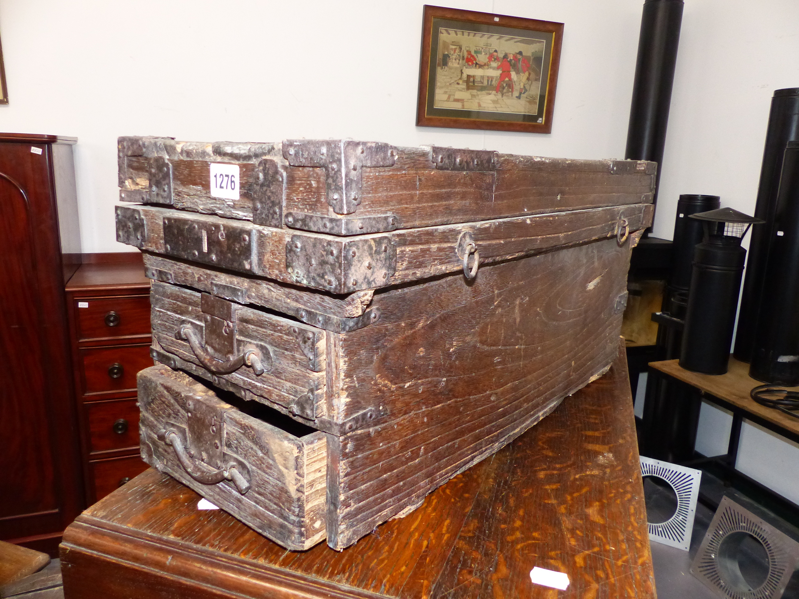 AN UNUSUAL FAR EASTERN IRON MOUNTED TRAVELLING CHEST.