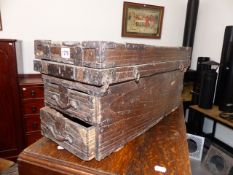 AN UNUSUAL FAR EASTERN IRON MOUNTED TRAVELLING CHEST.