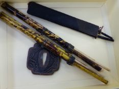 TWO JAPANESE TORTOISHELL AND BRASS MOUNTED TROUSSE EATING SETS, TOGETHER WITH A PAIR OF MINIATURE