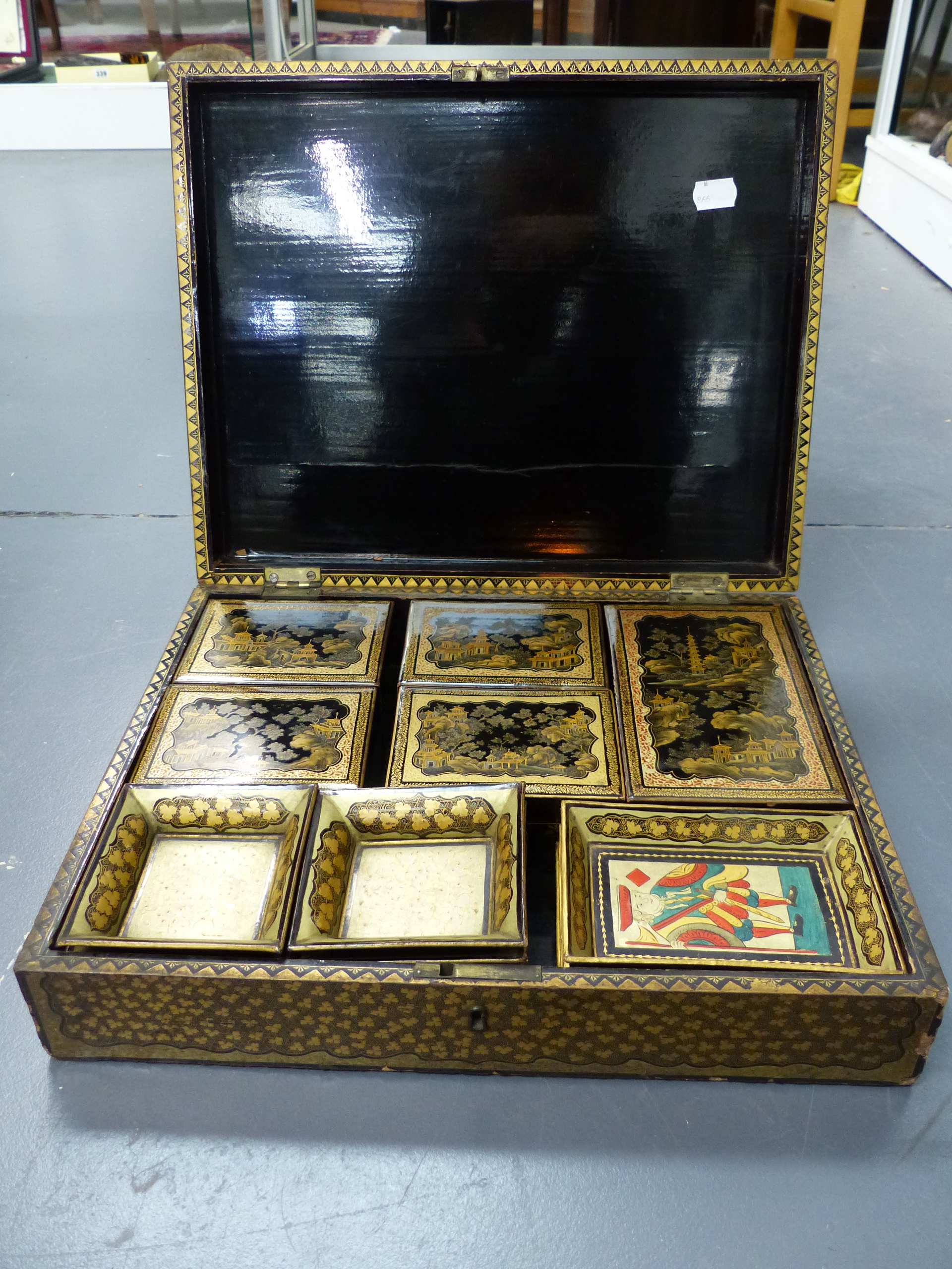 AN UNUSUALLY COMPLETE CHINESE EXPORT BLACK LACQUER GAMES BOX WITH INTERIOR TRAYS AND COVERED - Image 4 of 28