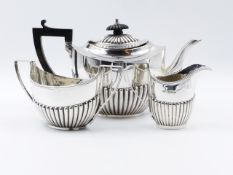 A THREE PART SILVER HALLMARKED TEA SET DATED 1897 BIRMINGHAM. APPROXIMATE WEIGHT ALL IN 486grms.