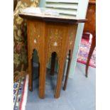 AN ANTIQUE SYRIAN INLAID HARDWOOD OCTAGONAL STAND WITH MOTHER OF PEARL INSETS. H.57, D.45cms. AND