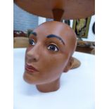 A VINTAGE CERAMIC MANNEKIN HEAD.