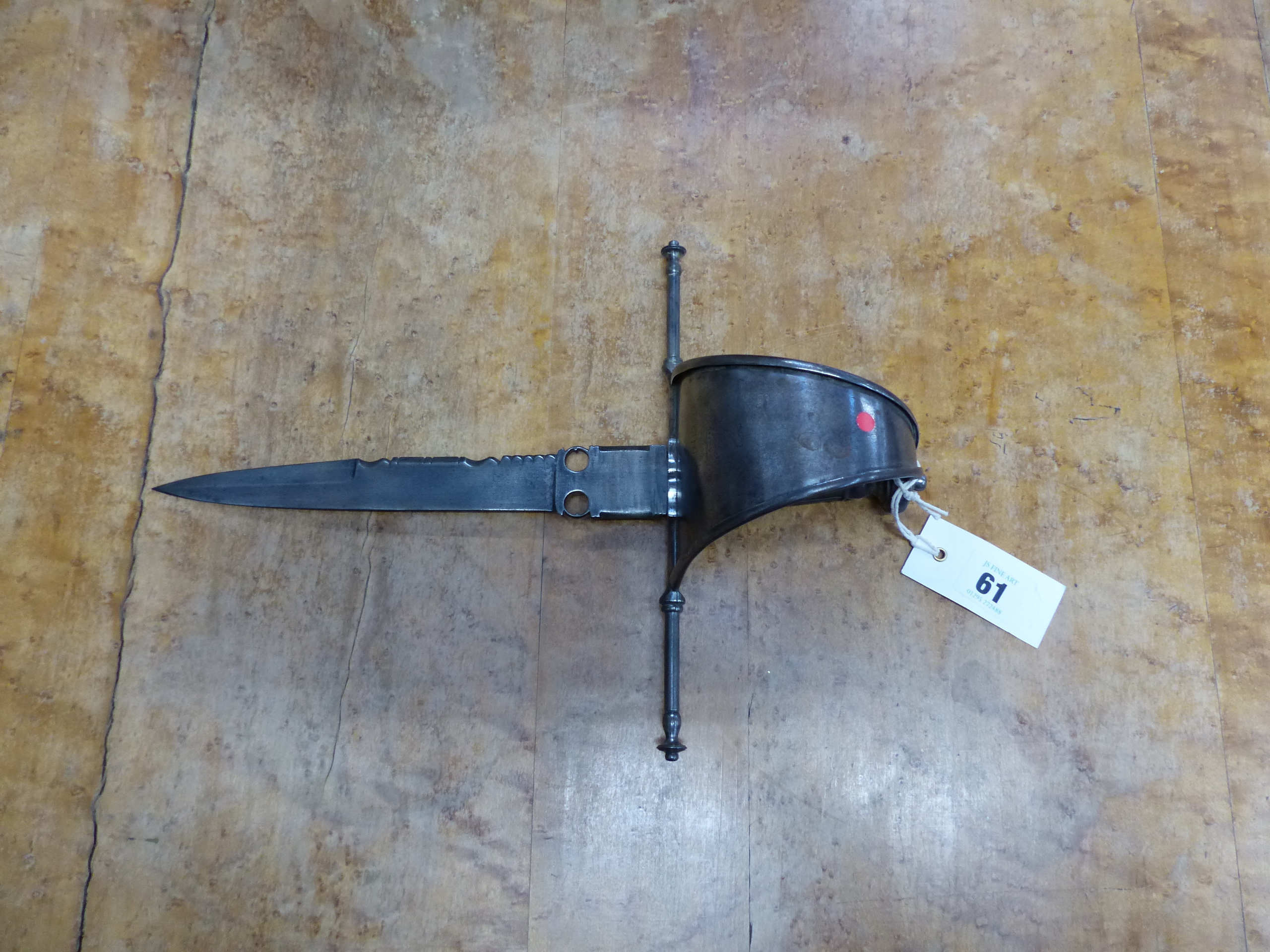 AN EARLY LEFT HAND GUARD DAGGER WITH CUT STEEL BLADE, BROAD CROSS GUARD AND PLAIN STEEL HILT, WIRE