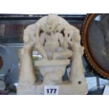 AN INDIAN CARVED MARBLE FIGURAL GROUP OF GANESH WITH ATTENDANTS. H.22cms.