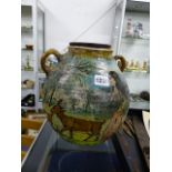 AN INTERESTING CONTINENTAL MAJOLICA TYPE TWIN HANDLE BALUSTER POTTERY VASE DECORATED WITH FIGURES