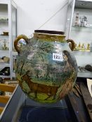 AN INTERESTING CONTINENTAL MAJOLICA TYPE TWIN HANDLE BALUSTER POTTERY VASE DECORATED WITH FIGURES