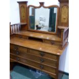 AN ARTS AND CRAFTS OAK DRESSING TABLE BY SHAPLAND & PETTER. W.123cms.