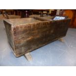 A LARGE RUSTIC ELM LOG BOX.