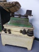 A RARE SET OF RADIO-MALT ADVERTISING BABY SCALES COMPLETE WITH WEIGHTS AND STAND.