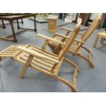 A PAIR OF GOOD QUALITY TEAK FOLDING STEAMER CHAIRS.
