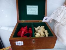 A SET OF STAUNTON PATTERN CARVED BONE CHESS PIECES CONTAINED IN A JAQUES MAHOGANY BOX.