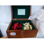 A SET OF STAUNTON PATTERN CARVED BONE CHESS PIECES CONTAINED IN A JAQUES MAHOGANY BOX.