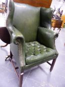 AN ANTIQUE GEO.I.STYLE LEATHER UPHOLSTERED WING BACK ARMCHAIR. W.82cms. OVERALL