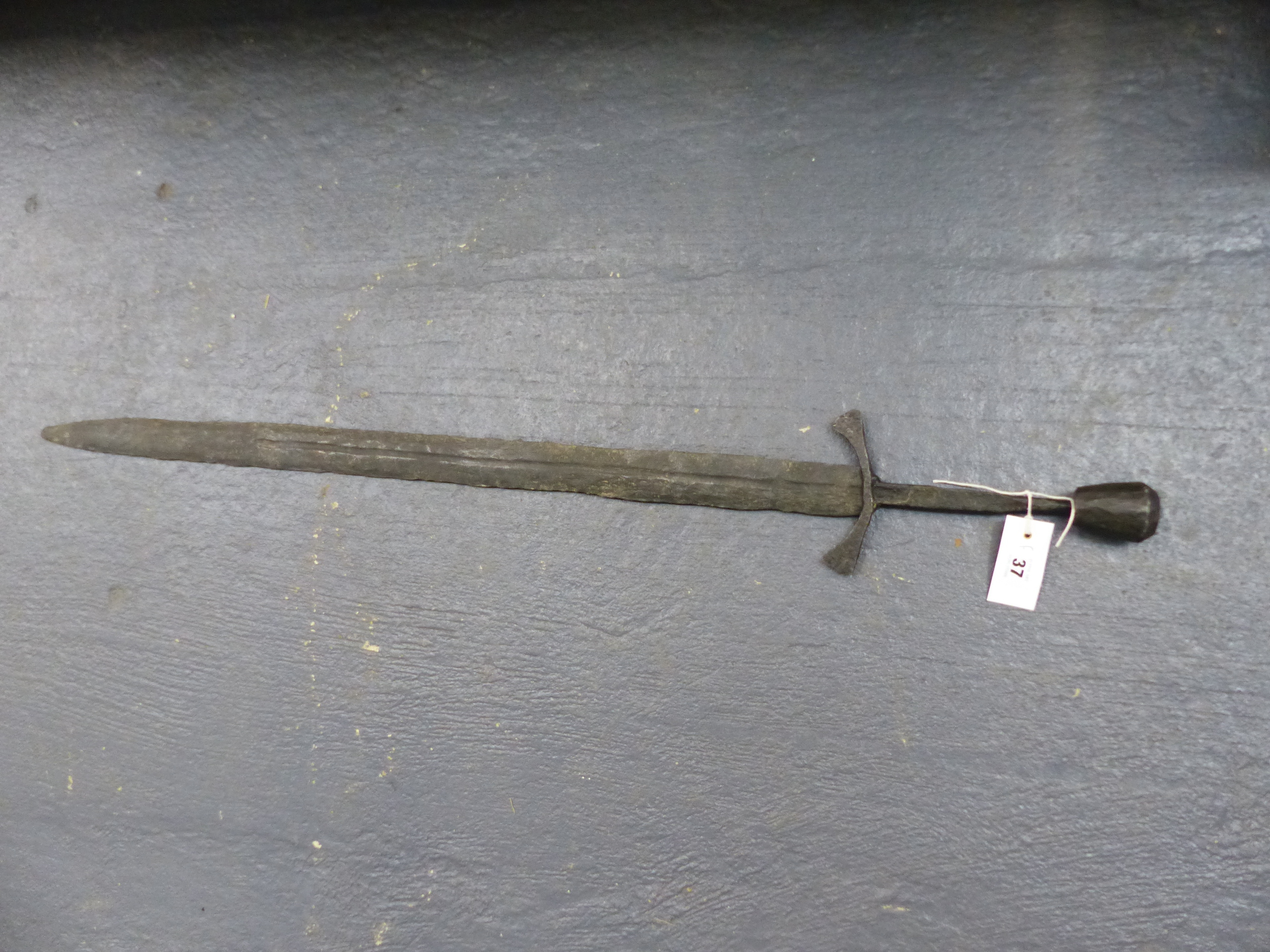 A LARGE MEDIEVAL TYPE BROADSWORD IN RELIC CONDITION