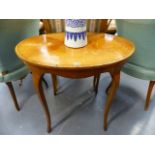 A 19th.C.SATINWOOD AND CROSSBANDED OVAL CENTRE TABLE ON SLENDER CABRIOLE LEGS. W.76cms.