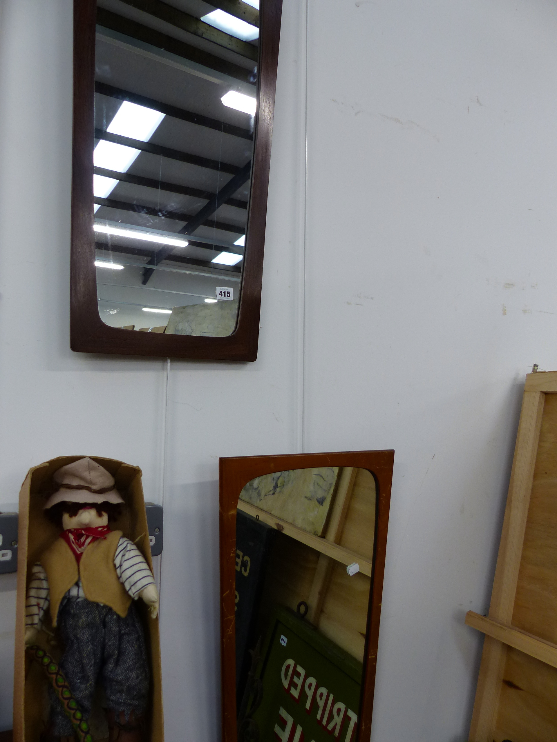 TWO MID CENTURY TEAK FRAMED MIRRORS.