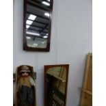 TWO MID CENTURY TEAK FRAMED MIRRORS.