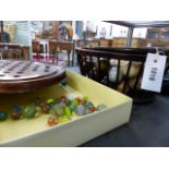 A MAHOGANY OVAL BASKET WITH HANDLE CONTAINING A COLLECTION OF POLISHED HARDSTONE BALLS TOGETHER WITH