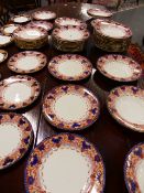 AN EXTENSIVE DOULTON WATTEAU PATTERN LATE VICTORIAN PART DINNER SERVICE COMPRISING PLATES OF VARIOUS