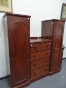 A SMALL LATE VICTORIAN MAHOGANY PILLAR BOX WARDROBE WITH FIVE DRAWERS FLANKED BY HANGING