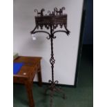 A PAIR OF 17th.C.STYLE WROUGHT IRON CANDLESTANDS. H.161cms.