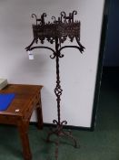 A PAIR OF 17th.C.STYLE WROUGHT IRON CANDLESTANDS. H.161cms.