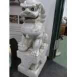 AN IMPRESSIVE PAIR OF CHINESE CARVED WHITE MARBLE FOO LIONS ON INTEGRAL PLINTHS. H.108cms.