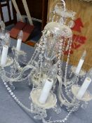 A LATE GEORGIAN STYLE SIX LIGHT CRYSTAL CHANDELIER. W.60 x H.55cms.