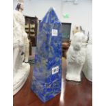 A LAPIS LAZULI VENEERED OBELISK TABLE ORNAMENT. H.32cms.