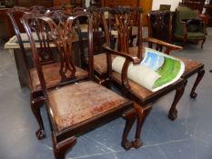 A SET OF SIX MID GEORGIAN STYLE MAHOGANY DINING CHAIRS ON CABRIOLE LEGS AND CLAW AND BALL FEET.