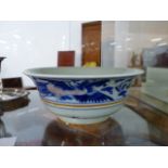 A CHINESE BLUE AND WHITE FLARED FORM FOOTED BOWL WITH DRAGON AND PHOENIX DECORATION, SIX CHARACTER