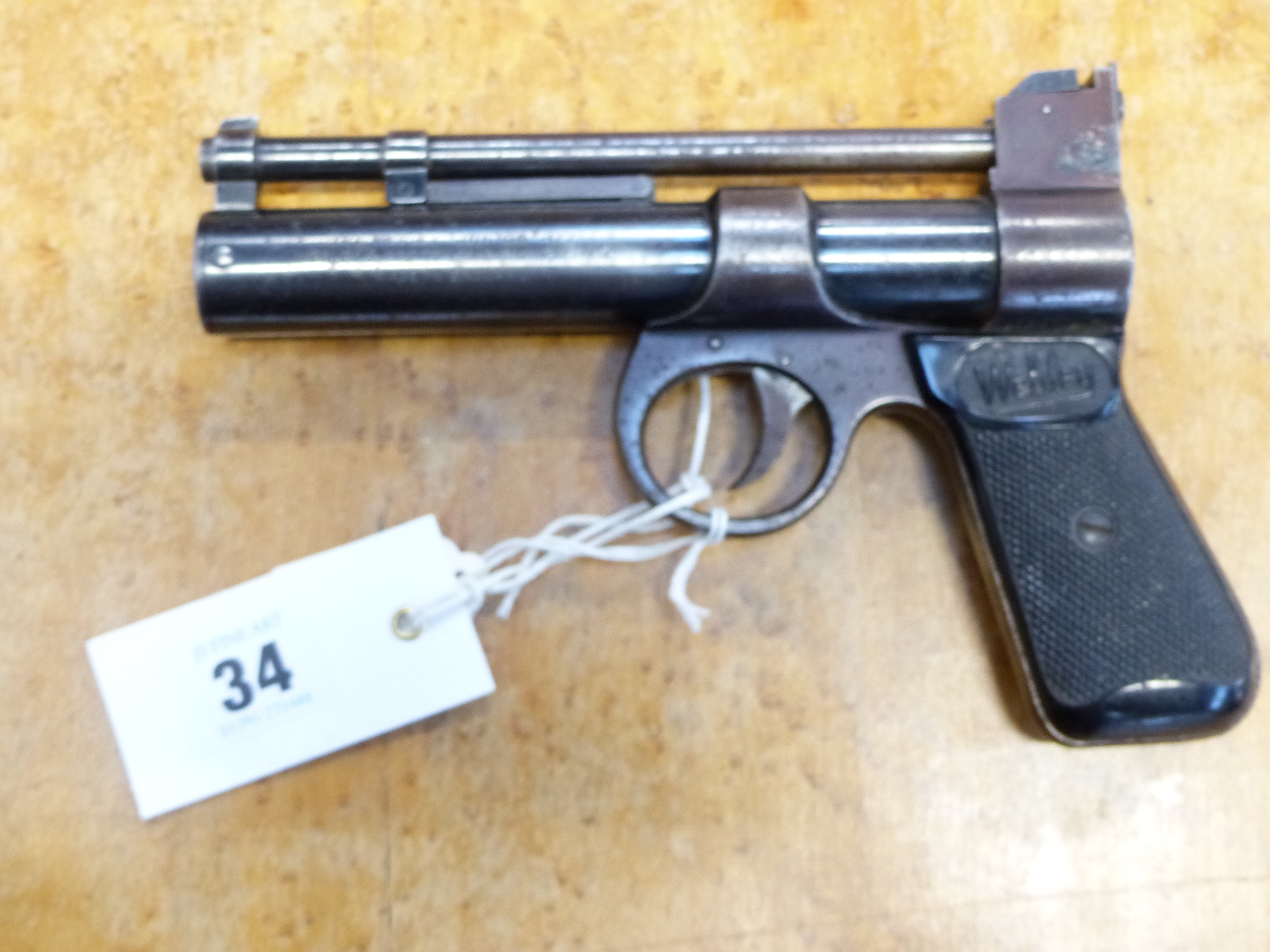 A VINTAGE WEBLEY JUNIOR AIR PISTOL WITH SPECIAL ORDER ENGRAVED DECORATIONS