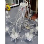 A LATE GEORGIAN STYLE EIGHT LIGHT CRYSTAL CHANDELIER. W.76 x H.55cms.