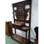 A VICTORIAN CARVED OAK HALLSTAND. W.107 x H.202cms.