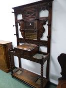 A VICTORIAN CARVED OAK HALLSTAND. W.107 x H.202cms.