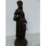 A LATE 19th.C.FRENCH BRONZE FIGURE OF A LADY IN COURTLY DRESS HOLDING A BOOK. H.36cms.